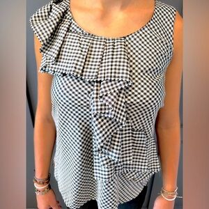Gingham ruffled sleeveless blouse